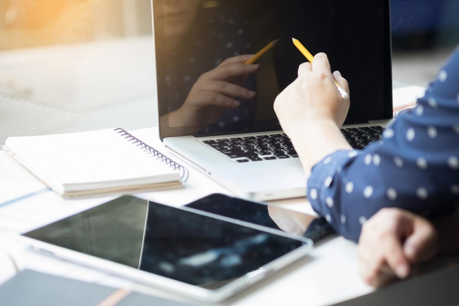 Business planning workshop session with financial documents and collaborative work