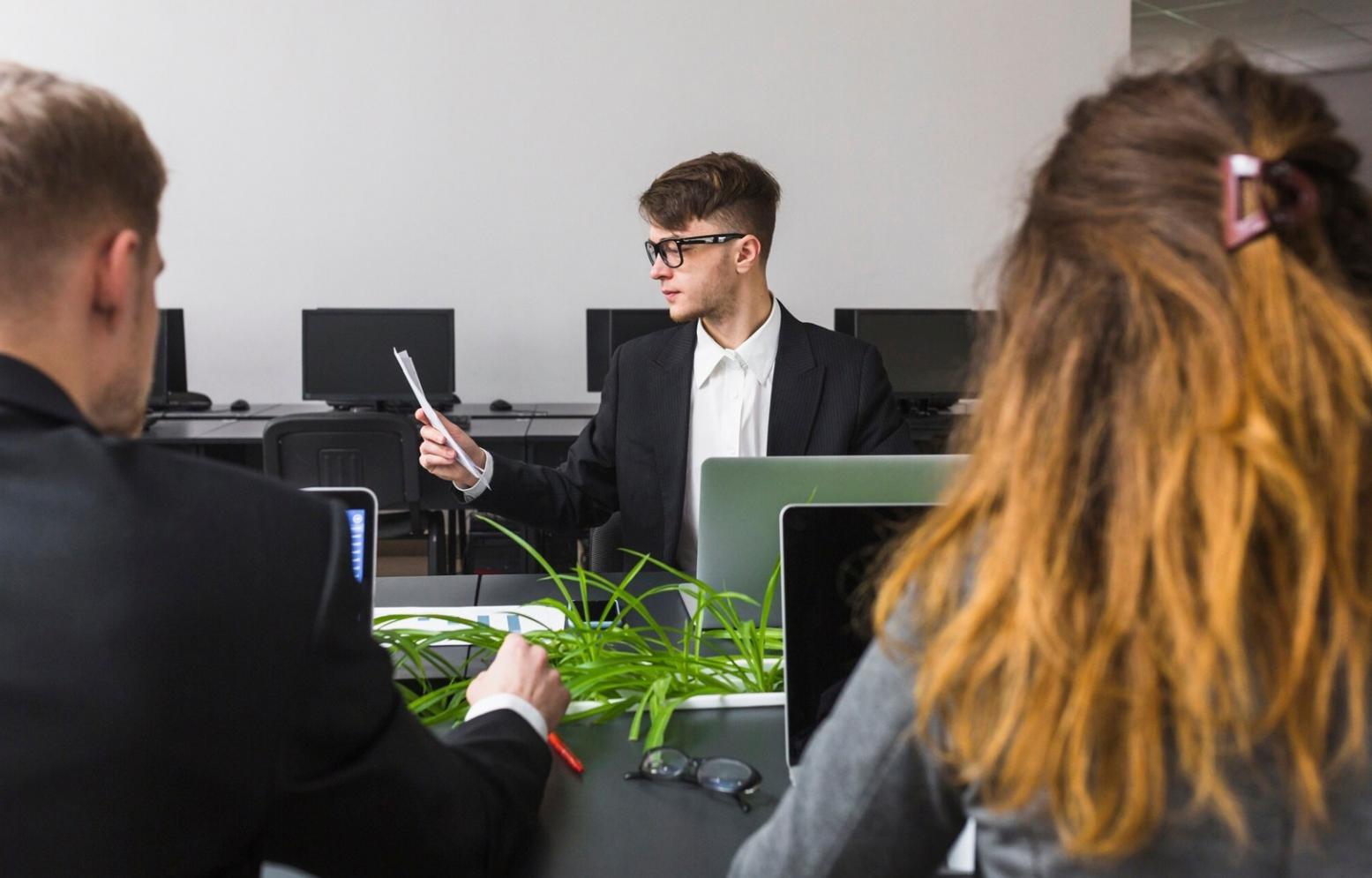 Financial planning session with detailed spreadsheet analysis and projections